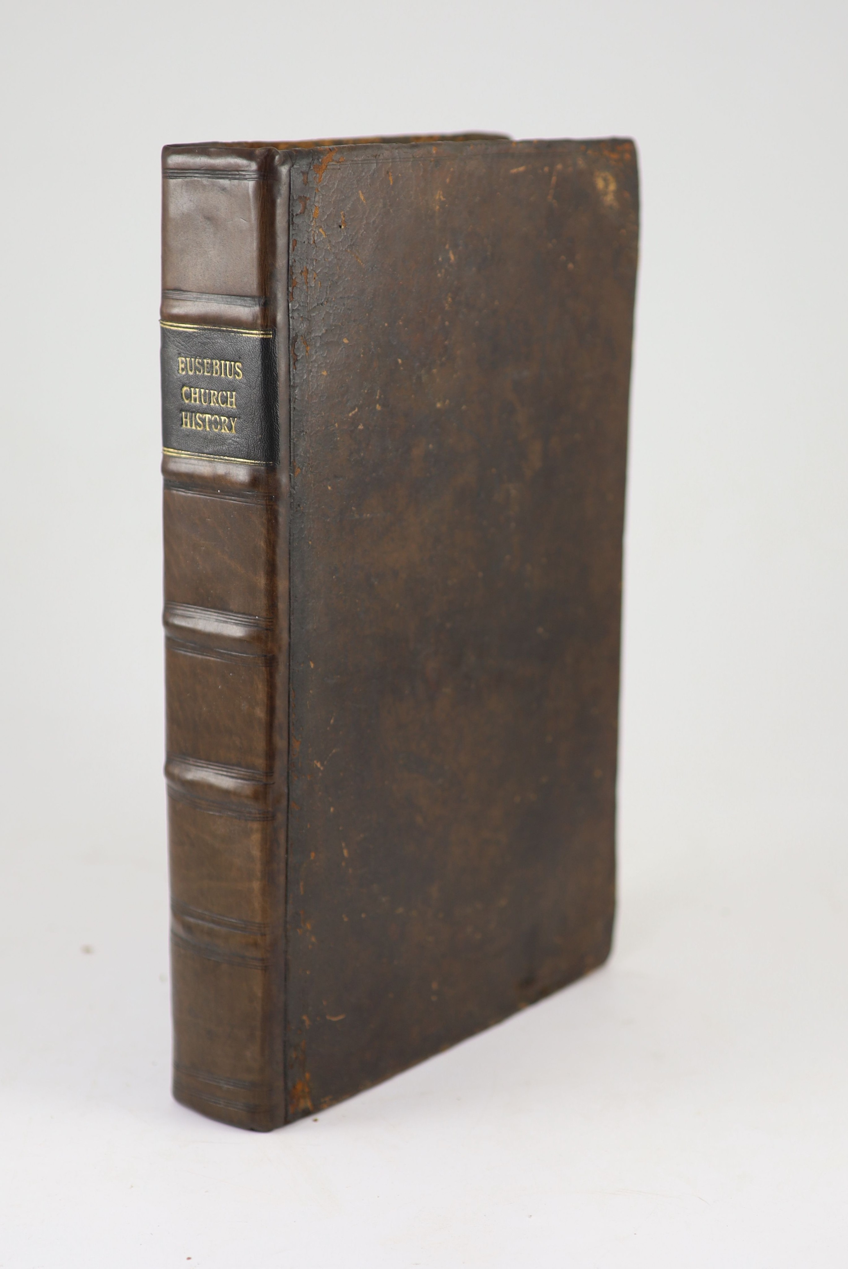 Eusebius [Eusebius Pamphilus] - The History of the Church from our Lords Incarnation, to the Twelfth year of the Emperour - Mauricius Tiberius... Calf with panelled spine and Morocco label, folio. Red and black ink title